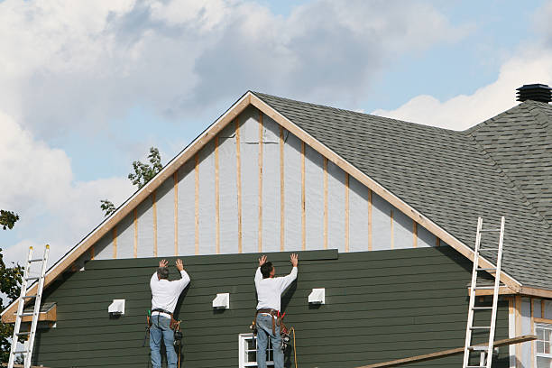 Professional Vinyl Siding technician working in Woodward, PA